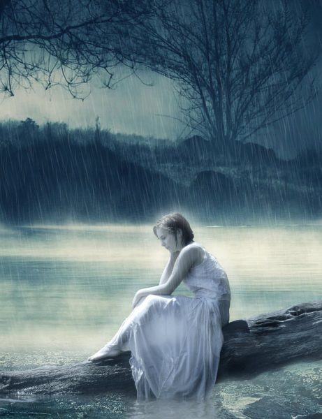 Cô gái buồn dưới mưa