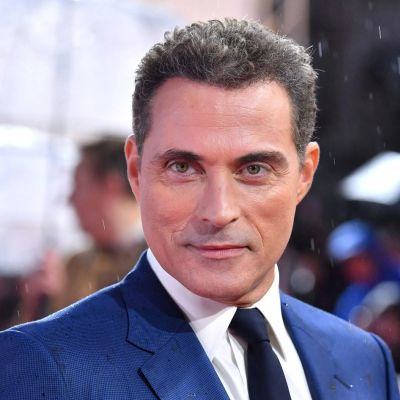 Rufus Sewell Is Portrayed As A Roger Salas In “Kaleidoscope”